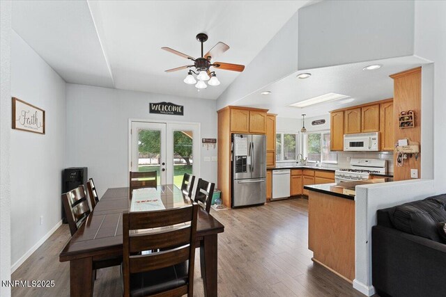 805 Samantha Cir, Fallon, NV 89406 - dining space with ceiling fan, wood finished floors, lofted ceiling, recessed lighting, and french doors