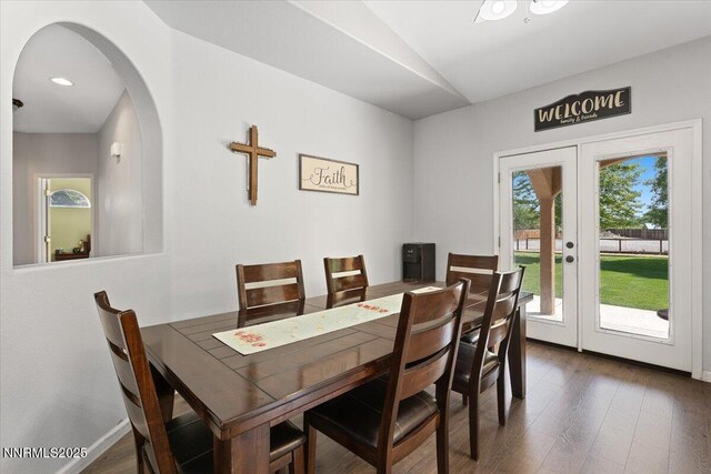 805 Samantha Cir, Fallon, NV 89406 - dining space with arched walkways, lofted ceiling, wood finished floors, french doors, and recessed lighting