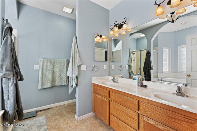 805 Samantha Cir, Fallon, NV 89406 - full bathroom featuring a bath, a stall shower, double vanity, and baseboards
