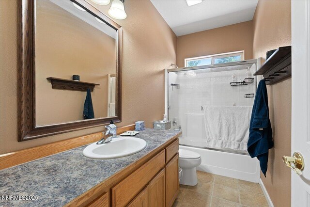 805 Samantha Cir, Fallon, NV 89406 - bathroom with toilet, vanity, bath / shower combo with glass door, and tile patterned flooring