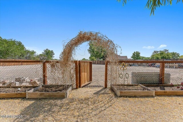 805 Samantha Cir, Fallon, NV 89406 - gate with a garden