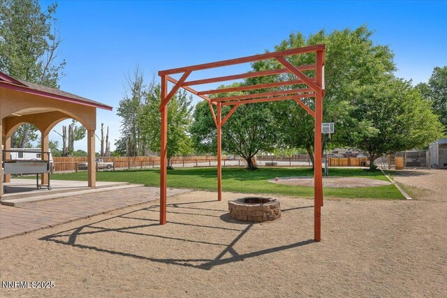 805 Samantha Cir, Fallon, NV 89406 - view of property's community with an outdoor fire pit, a pergola, and a patio