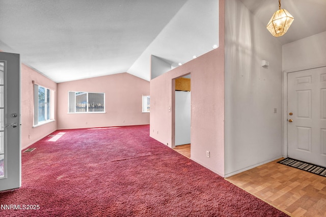 1331 Victoria Dr, Gardnerville, NV 89460 - carpeted entryway featuring vaulted ceiling and baseboards