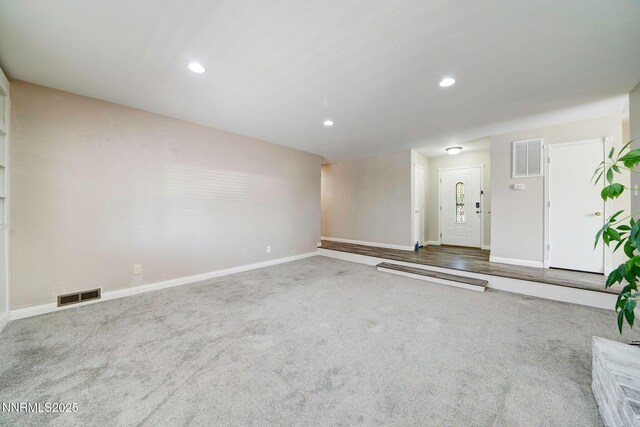 715 Emerson Way, Sparks, NV 89431 - unfurnished living room with carpet, recessed lighting, and baseboards