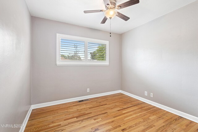 2441 Riviera St, Reno, NV 89509 - spare room with light wood finished floors, baseboards, and ceiling fan