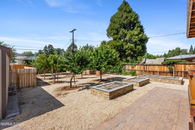 2441 Riviera St, Reno, NV 89509 - view of patio / terrace with a garden