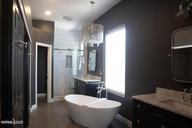 1570 Caughlin Creek Rd, Reno, NV 89519 - full bath featuring two vanities, tile patterned flooring, a shower stall, and a soaking tub