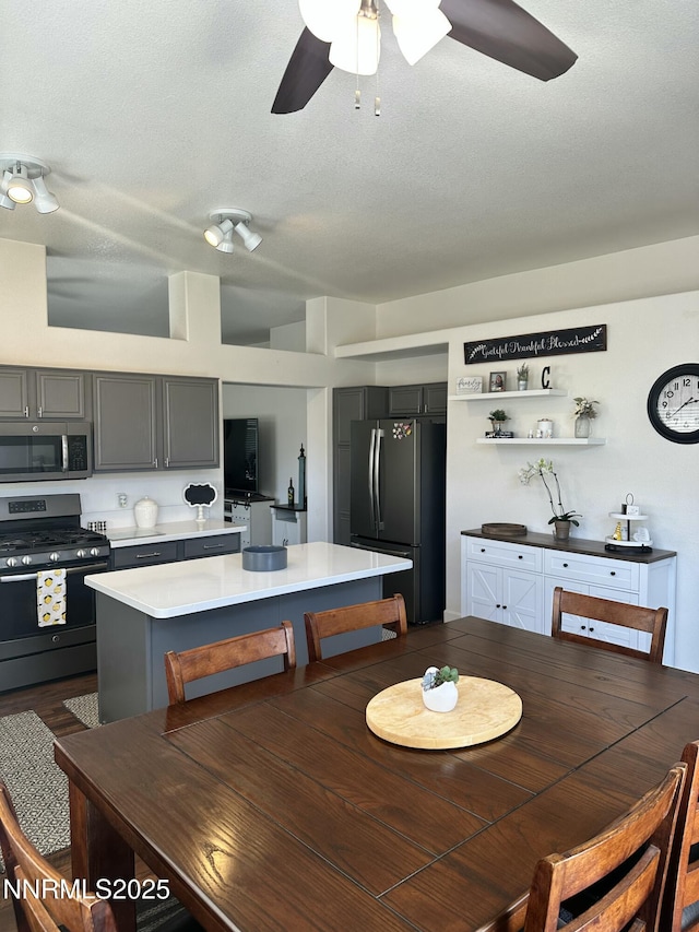 2787 Foxhill Dr, Carson City, NV 89706 - dining space featuring a ceiling fan and a textured ceiling