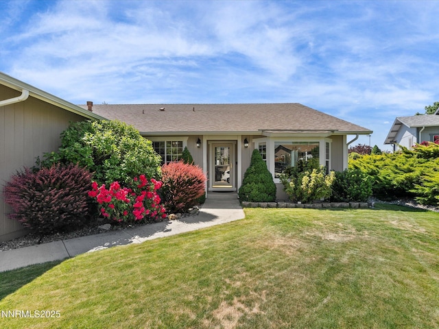 15 Cormorant Ct, Sparks, NV 89441 - ranch-style home featuring a front lawn and a shingled roof