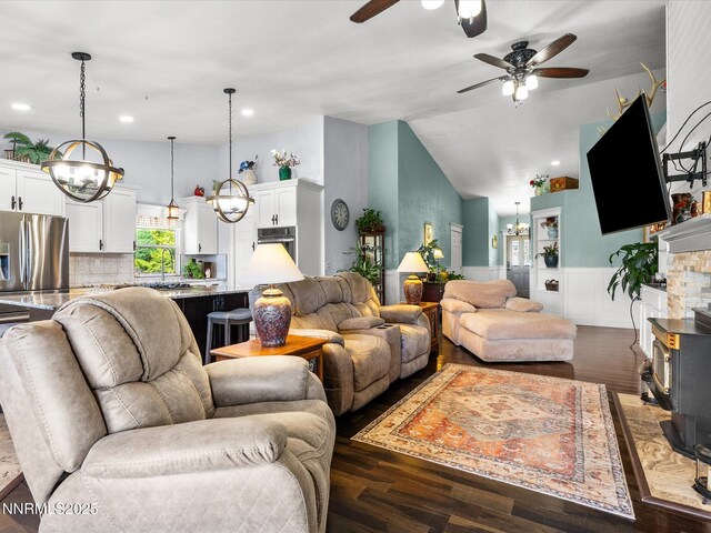 15 Cormorant Ct, Sparks, NV 89441 - living room featuring a chandelier, ceiling fan, dark wood-style floors, a wainscoted wall, and recessed lighting