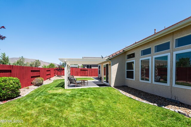 1781 Glen Cove Ct, Reno, NV 89521 - view of yard with a pergola, a patio area, and a mountain view