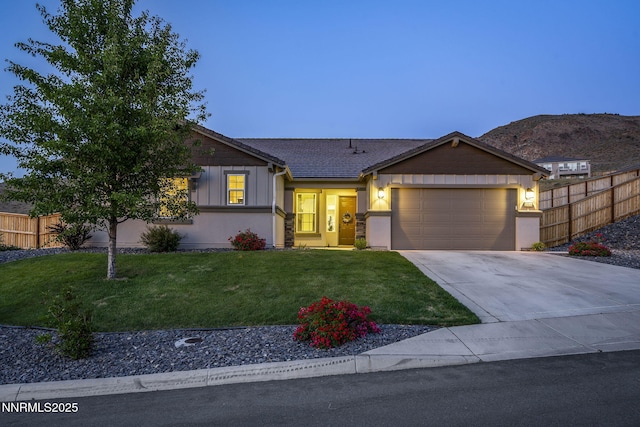 10450 Palladium Mine Dr, Reno, NV 89521 - single story home with a garage, driveway, and stucco siding