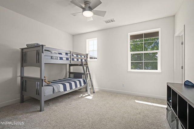 10450 Palladium Mine Dr, Reno, NV 89521 - carpeted bedroom with multiple windows, baseboards, and ceiling fan