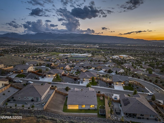 10450 Palladium Mine Dr, Reno, NV 89521 - aerial view at dusk of a mountain view and a residential view