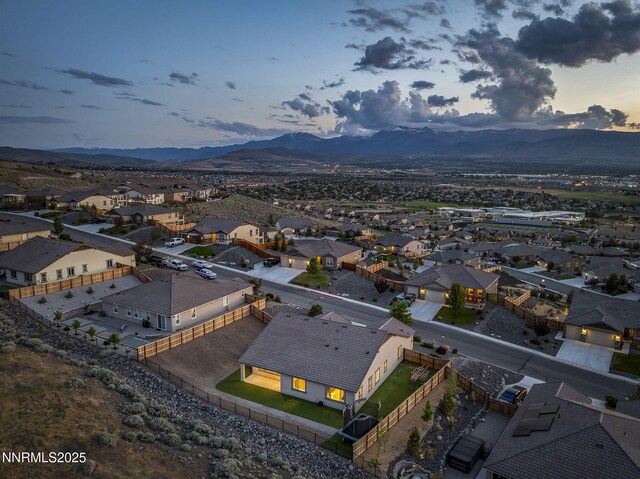 10450 Palladium Mine Dr, Reno, NV 89521 - aerial view at dusk of a mountain view and a residential view