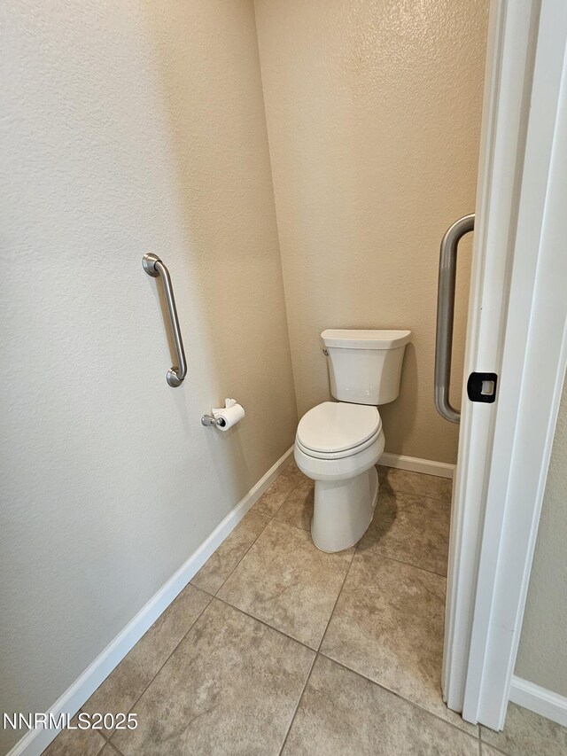 217 Bristol Wells Ct, Spanish Springs, NV 89441 - bathroom featuring toilet, tile patterned floors, and baseboards