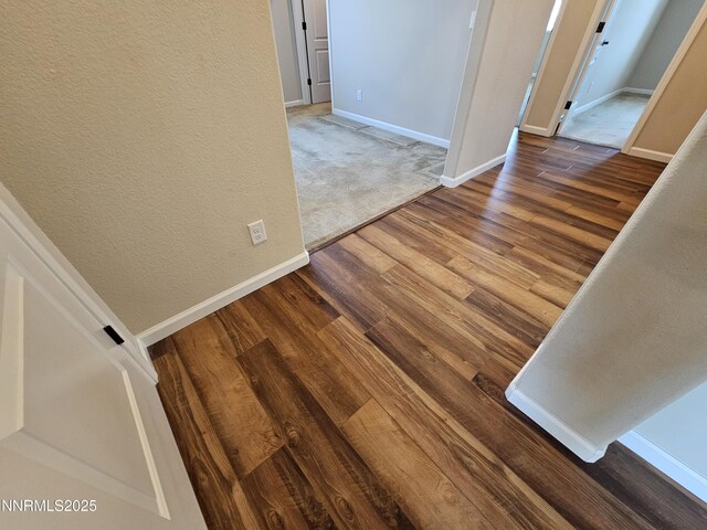 217 Bristol Wells Ct, Spanish Springs, NV 89441 - corridor featuring wood finished floors and baseboards