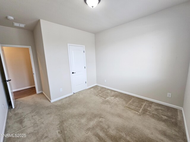 217 Bristol Wells Ct, Spanish Springs, NV 89441 - unfurnished bedroom featuring carpet flooring and baseboards