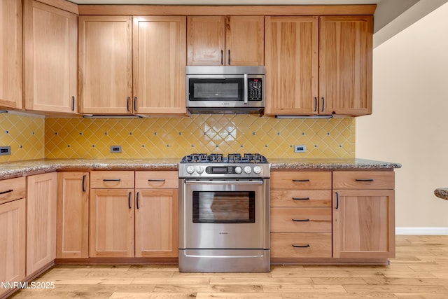 3467 Skyline Blvd, Reno, NV 89509 - kitchen featuring stainless steel appliances, light brown cabinetry, and light wood-type flooring