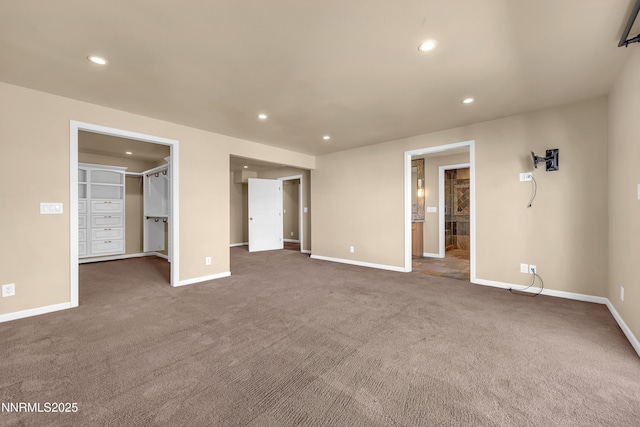3467 Skyline Blvd, Reno, NV 89509 - unfurnished bedroom featuring a spacious closet, carpet, baseboards, recessed lighting, and ensuite bathroom