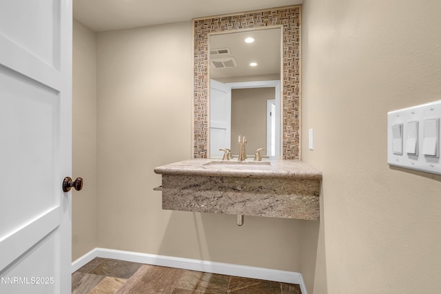 3467 Skyline Blvd, Reno, NV 89509 - bathroom with a sink and baseboards