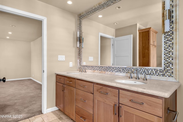3467 Skyline Blvd, Reno, NV 89509 - bathroom with double vanity, baseboards, backsplash, and recessed lighting