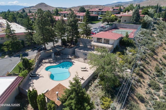 3467 Skyline Blvd, Reno, NV 89509 - aerial view of residential area with mountains and a pool area