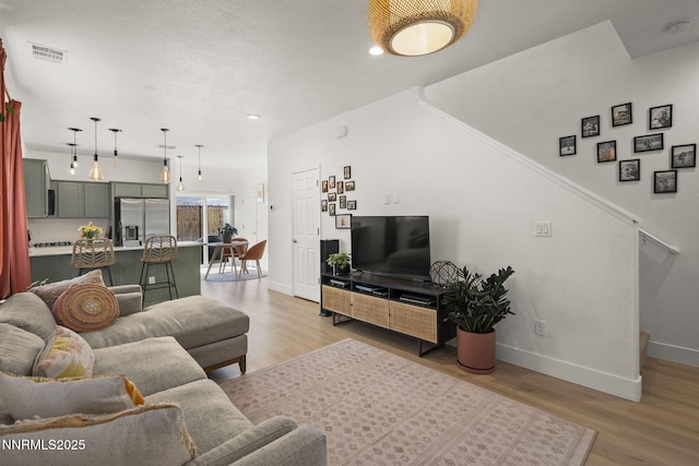 3621 Pimlico St, Reno, NV 89512 - living room featuring light wood-type flooring and recessed lighting