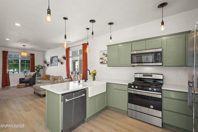 3621 Pimlico St, Reno, NV 89512 - kitchen featuring green cabinetry, appliances with stainless steel finishes, and recessed lighting