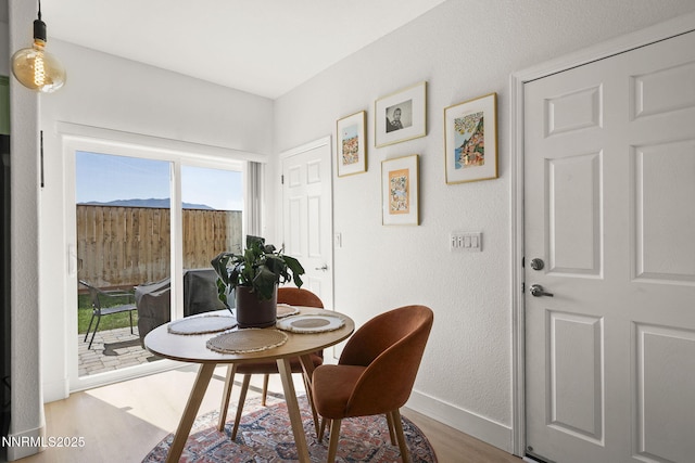 3621 Pimlico St, Reno, NV 89512 - dining room with wood finished floors and a textured wall