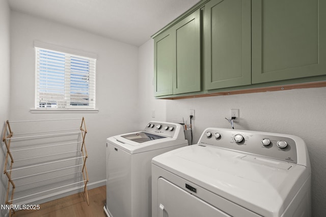 3621 Pimlico St, Reno, NV 89512 - laundry room with cabinet space, washer and dryer, and light wood-style floors