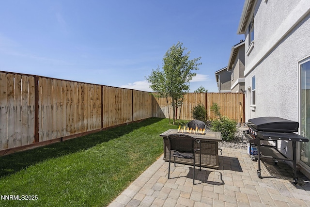 3621 Pimlico St, Reno, NV 89512 - fenced backyard featuring a patio and a grill