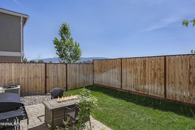 3621 Pimlico St, Reno, NV 89512 - fenced backyard featuring a patio and a fire pit