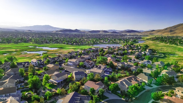 10595 Baton Ct, Reno, NV 89521 - aerial view of property and surrounding area featuring nearby suburban area and a water and mountain view