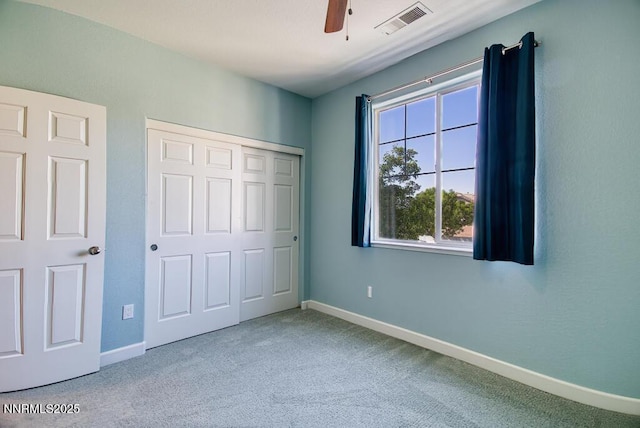 10595 Baton Ct, Reno, NV 89521 - unfurnished bedroom featuring carpet flooring, baseboards, a closet, and a ceiling fan