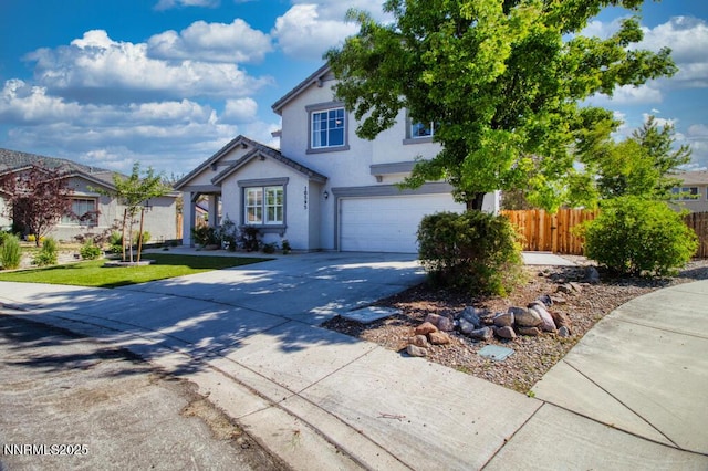 10595 Baton Ct, Reno, NV 89521 - traditional-style home featuring concrete driveway, an attached garage, and stucco siding