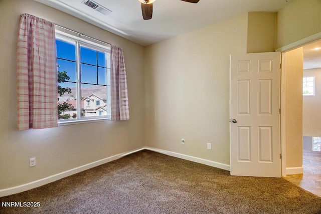 10595 Baton Ct, Reno, NV 89521 - carpeted empty room with a ceiling fan and baseboards