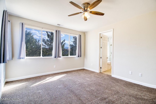 10595 Baton Ct, Reno, NV 89521 - carpeted empty room featuring a ceiling fan and baseboards