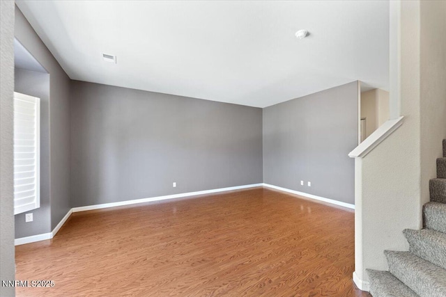 4136 Kathleen Denise Ln, Reno, NV 89503 - unfurnished room featuring stairs, wood finished floors, baseboards, and a smoke detector