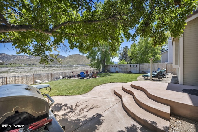 3250 Eaglewood Dr, Reno, NV 89502 - view of patio with a mountain view and area for grilling