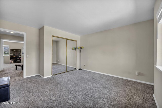 3250 Eaglewood Dr, Reno, NV 89502 - unfurnished bedroom featuring carpet flooring, baseboards, and a closet