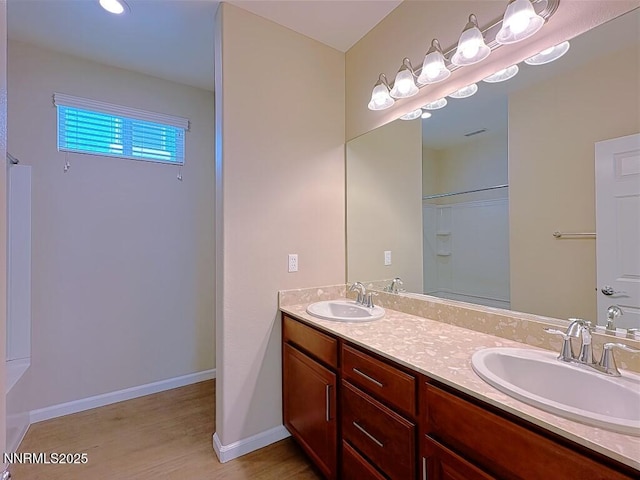 2180 Alamo Square Way, Reno, NV 89509 - full bath featuring double vanity, wood finished floors, and a shower