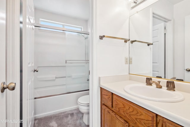 7554 Whimbleton Way, Reno, NV 89511 - bathroom featuring vanity, toilet, and combined bath / shower with glass door