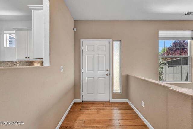 10559 Iron Point Cir, Reno, NV 89521 - entryway with light wood-style flooring and healthy amount of natural light