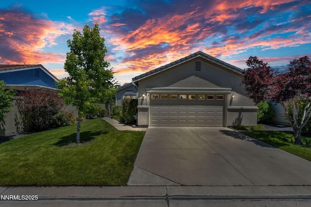 10559 Iron Point Cir, Reno, NV 89521 - single story home with concrete driveway, an attached garage, and a tiled roof