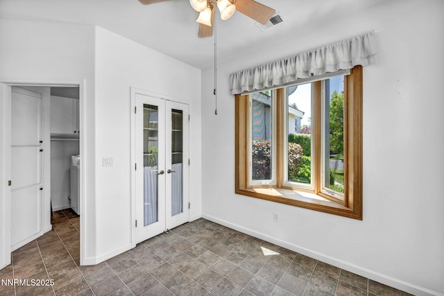 10559 Iron Point Cir, Reno, NV 89521 - unfurnished bedroom with french doors and ceiling fan