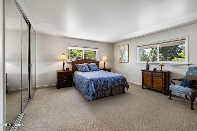 1435 Palisade Dr, Reno, NV 89509 - bedroom featuring light carpet, baseboards, and a closet