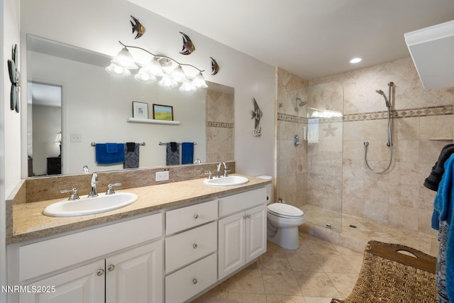 1435 Palisade Dr, Reno, NV 89509 - bathroom with tiled shower, double vanity, toilet, and tile patterned flooring