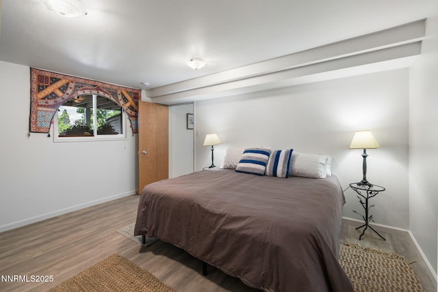 1435 Palisade Dr, Reno, NV 89509 - bedroom featuring wood finished floors and baseboards