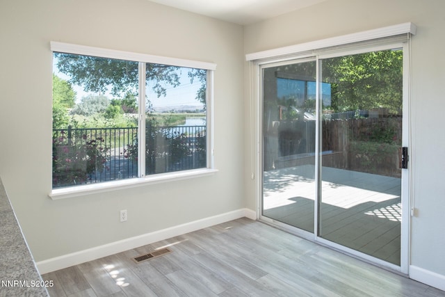 4734 Tierrapark Ct, Reno, NV 89502 - empty room with wood finished floors and baseboards